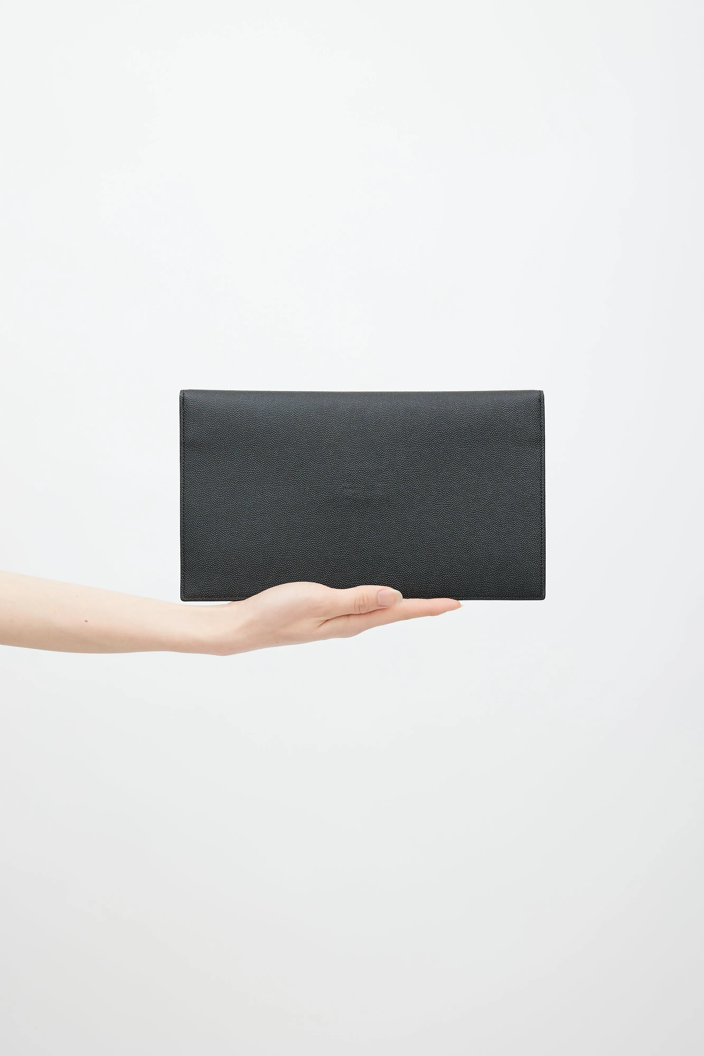 Black Uptown Monogram Pebbled Leather Clutch
